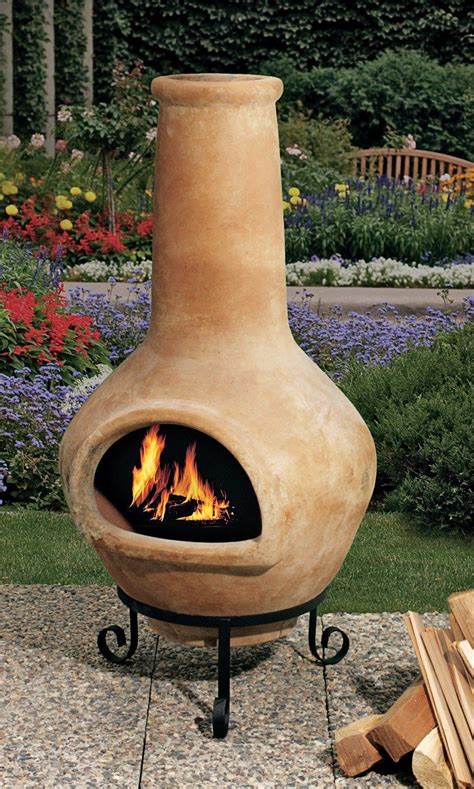 It came down to a mix of mid-century modern meets earthy. . Terracotta chiminea